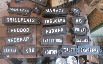 Gjutjärnsskylt: Vedbod