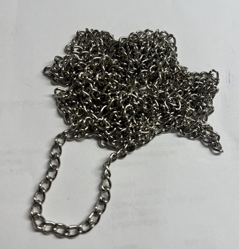 Spjäll- och ventilkedja i metall