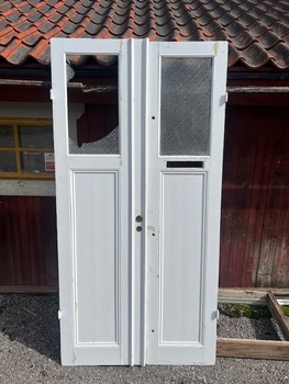 Dubbeldörr med glas 115 x 230 cm, finns i Överjärva